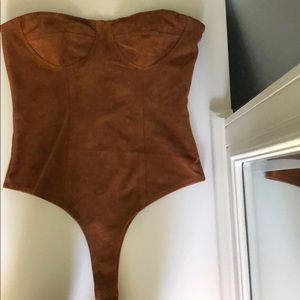 Body suit with snaps